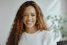 Woman with freckles smiling